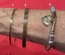 Gold Bracelets, Thin band, thick band, and Heart Charm.